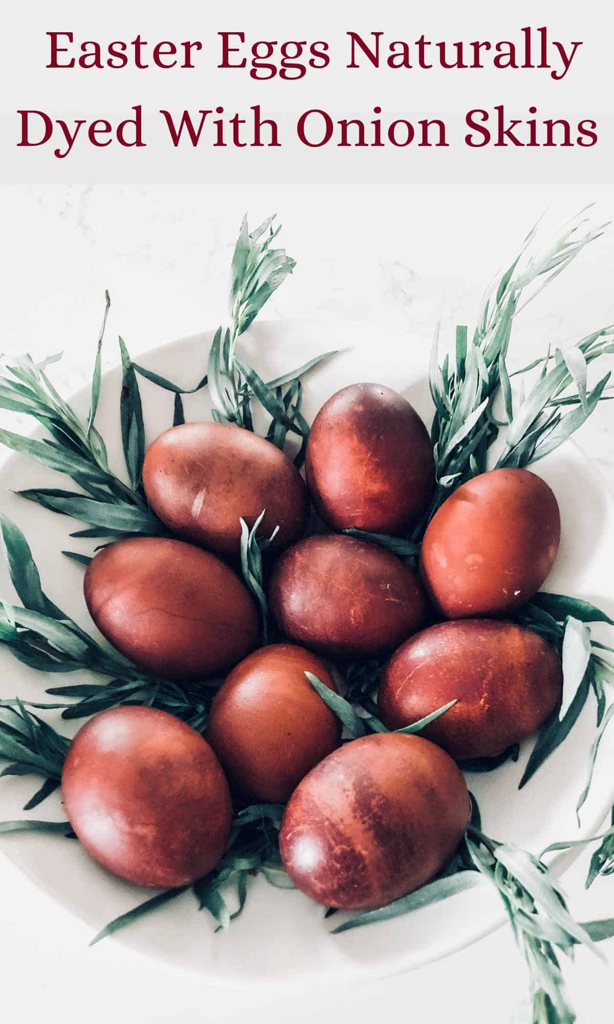 A plate of red Easter eggs naturally dyed with onion skins decorated with tarragon