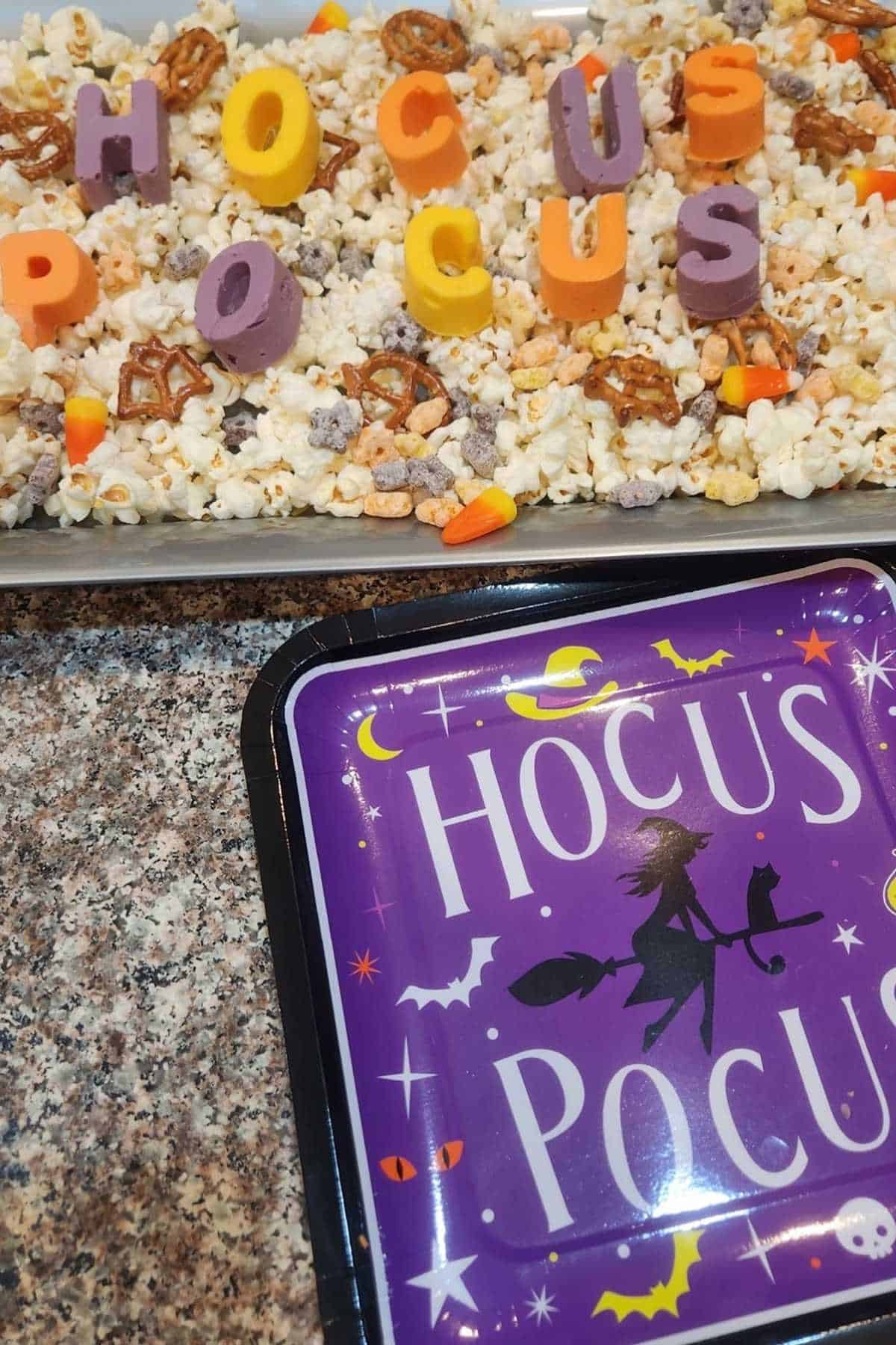 A tray of hocus pocus popcorn snacks.