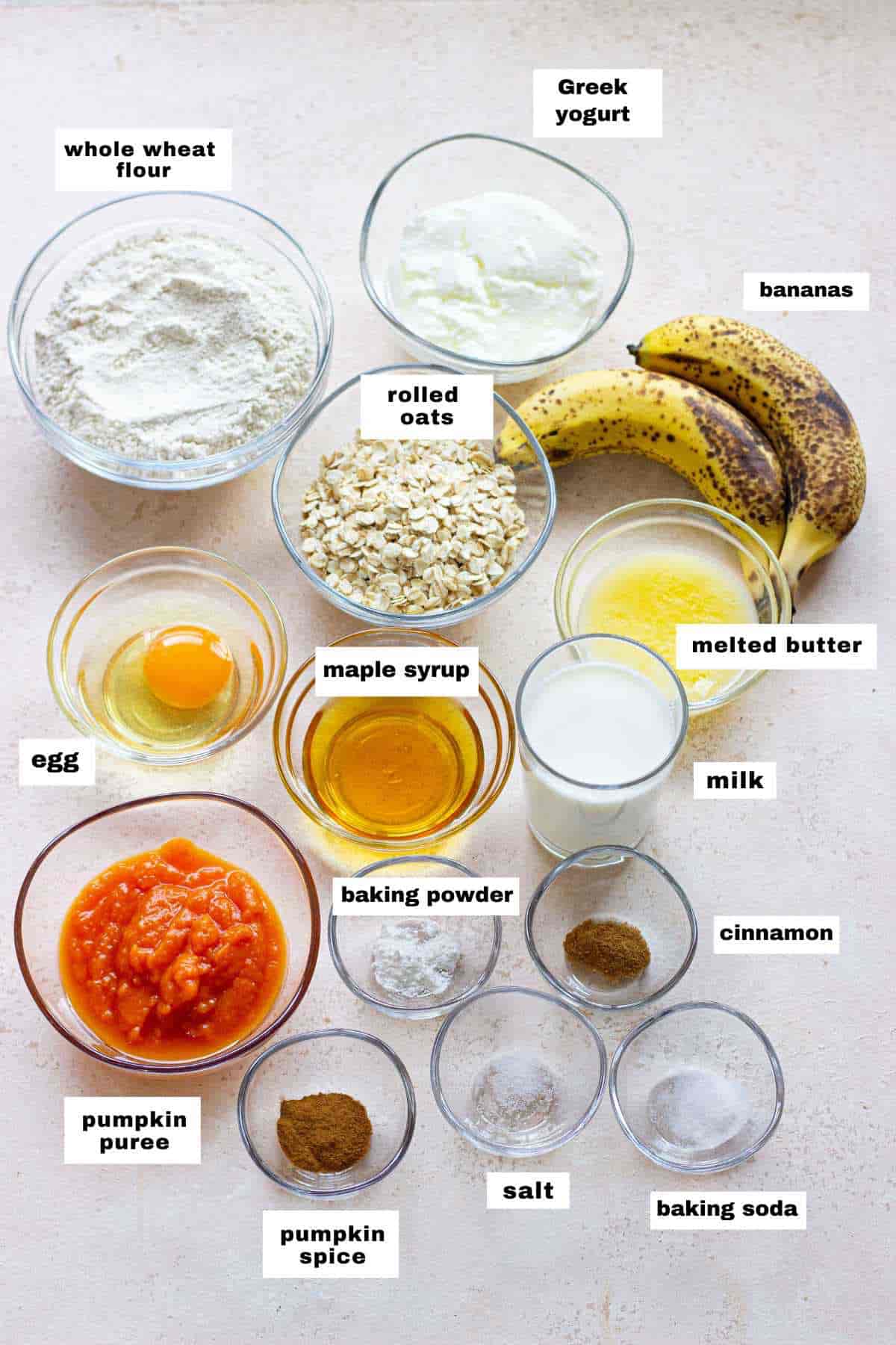 The ingredients for a pumpkin banana oat bread recipe.