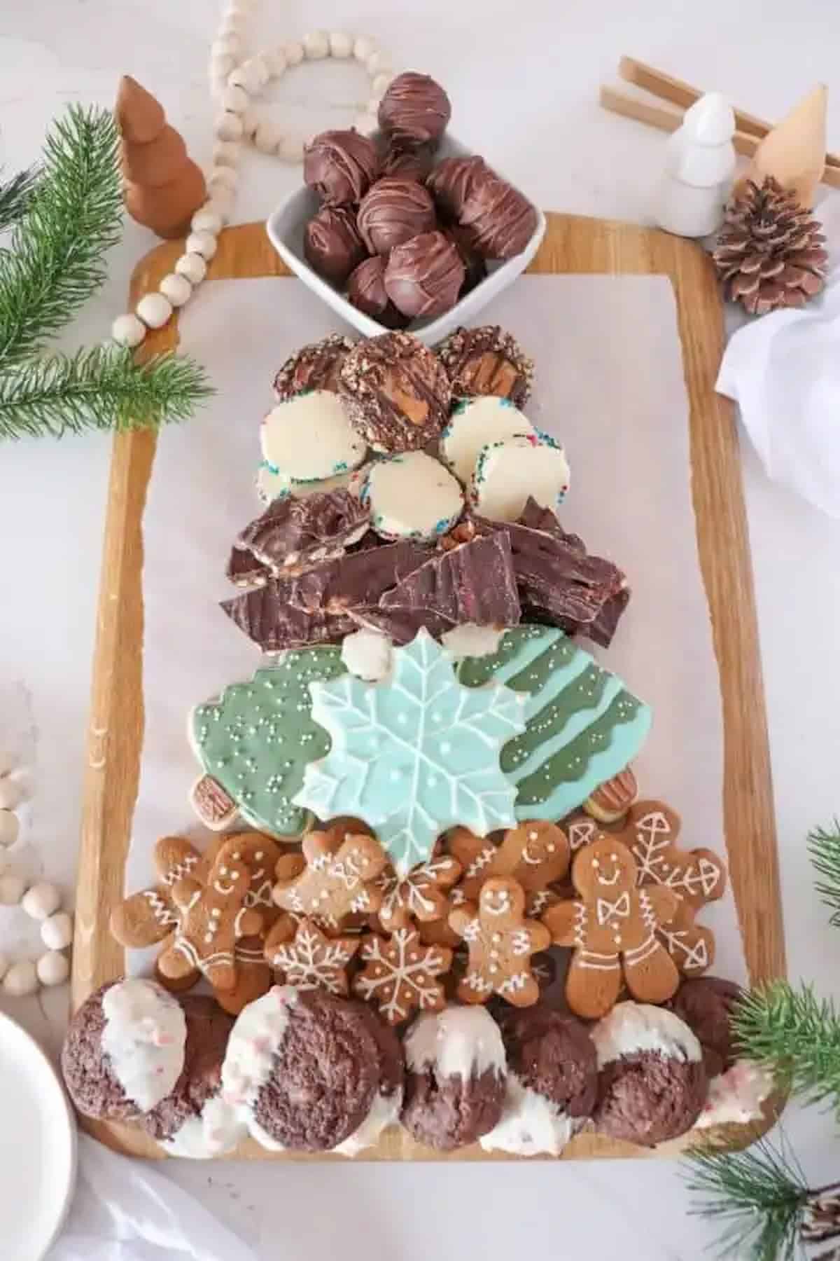 A Christmas tree made of cookies and chocolates.