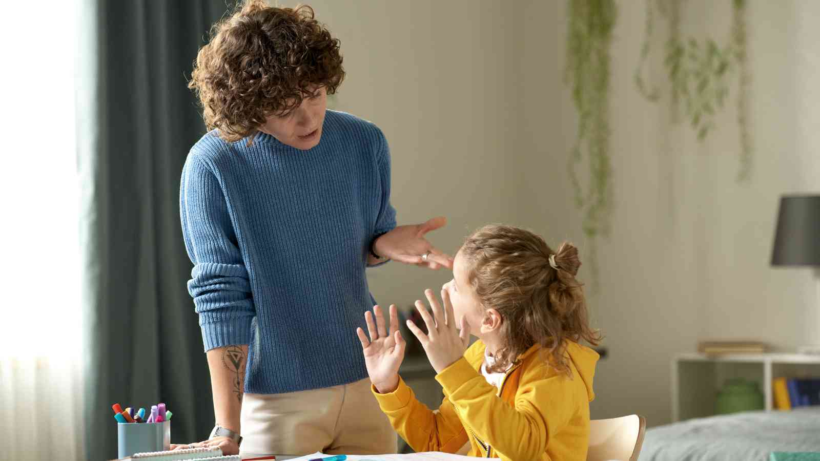 A mom explaining something to her child.