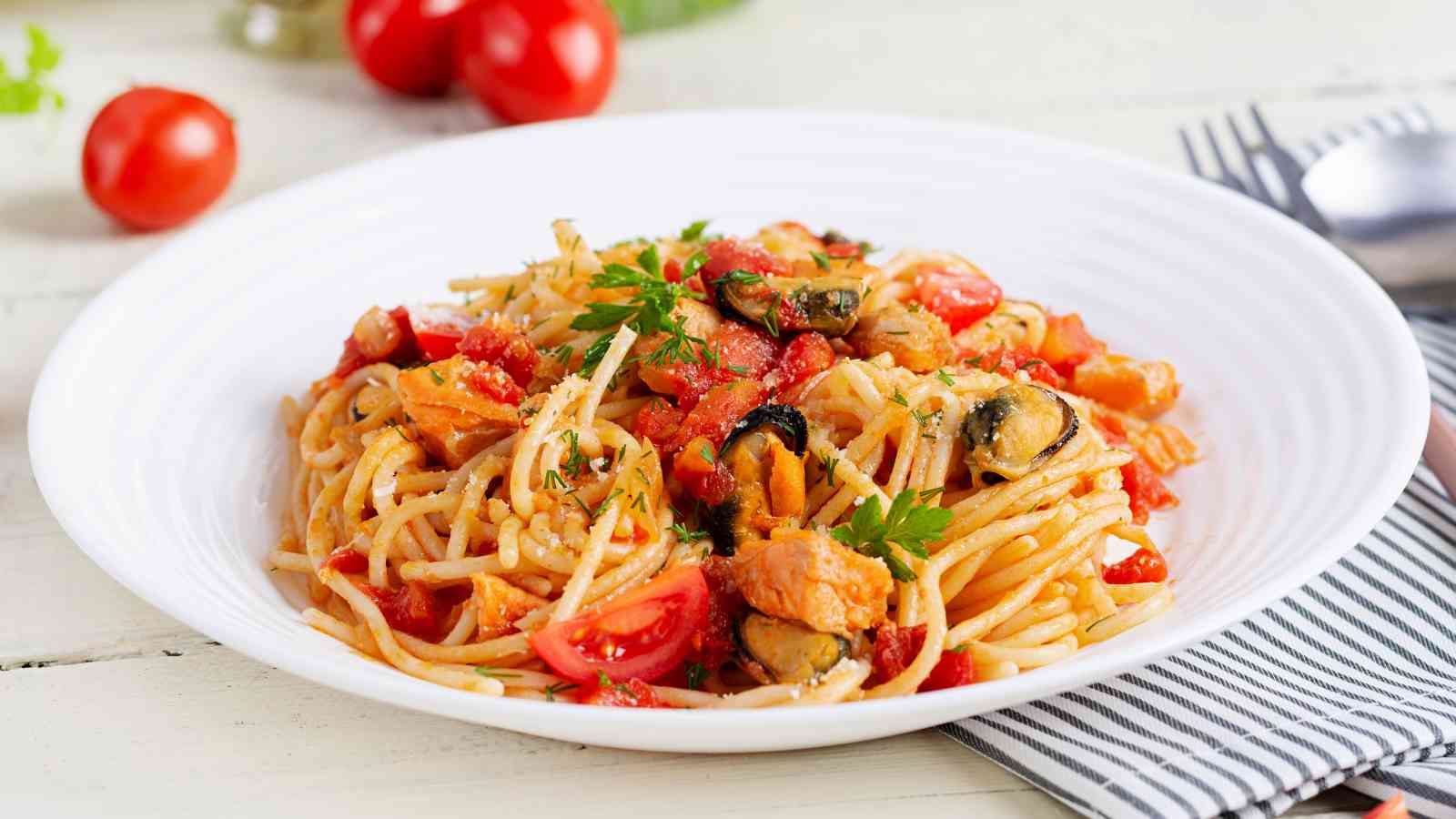 A plate of marinara pasta.