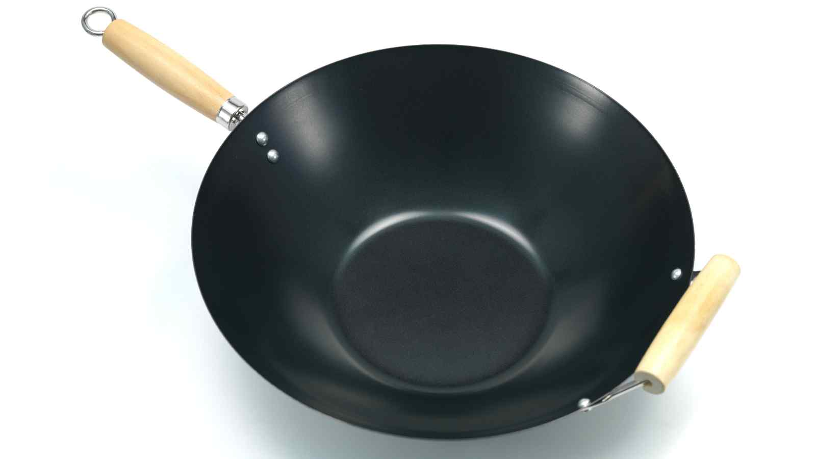 Black wok with wooden handles on both sides, photographed against a plain white background.