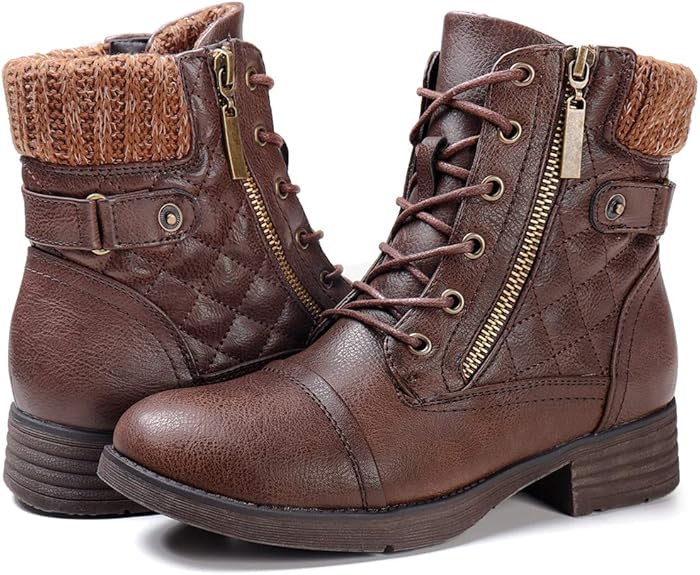 A brown ankle combat lace up booties with padded collars.