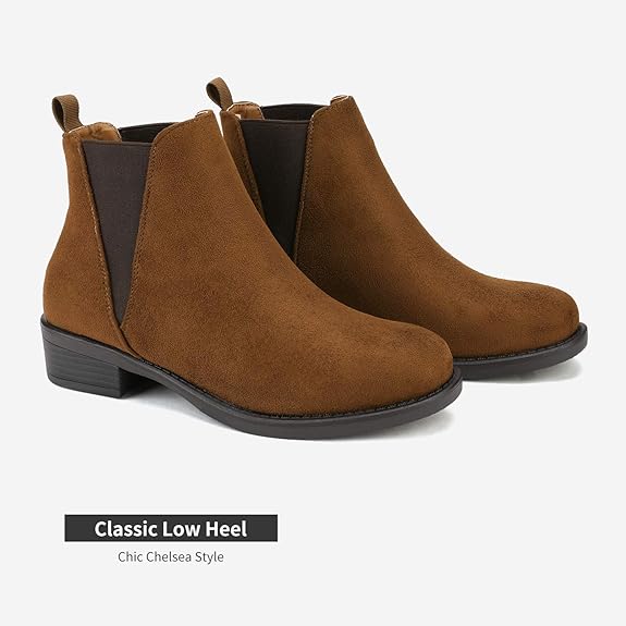 A brown chunky low heeled ankle boots with plush linings.