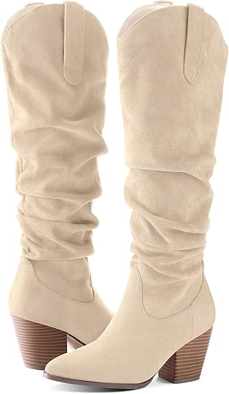 A soft suede cowboy knee-high pull on slouchy boots with a low chunky heels.