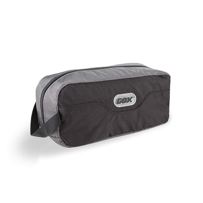 A rectangular black and gray travel toiletry bag with a zipper and a small handle on one end. The brand logo "Gox" is displayed on the front.