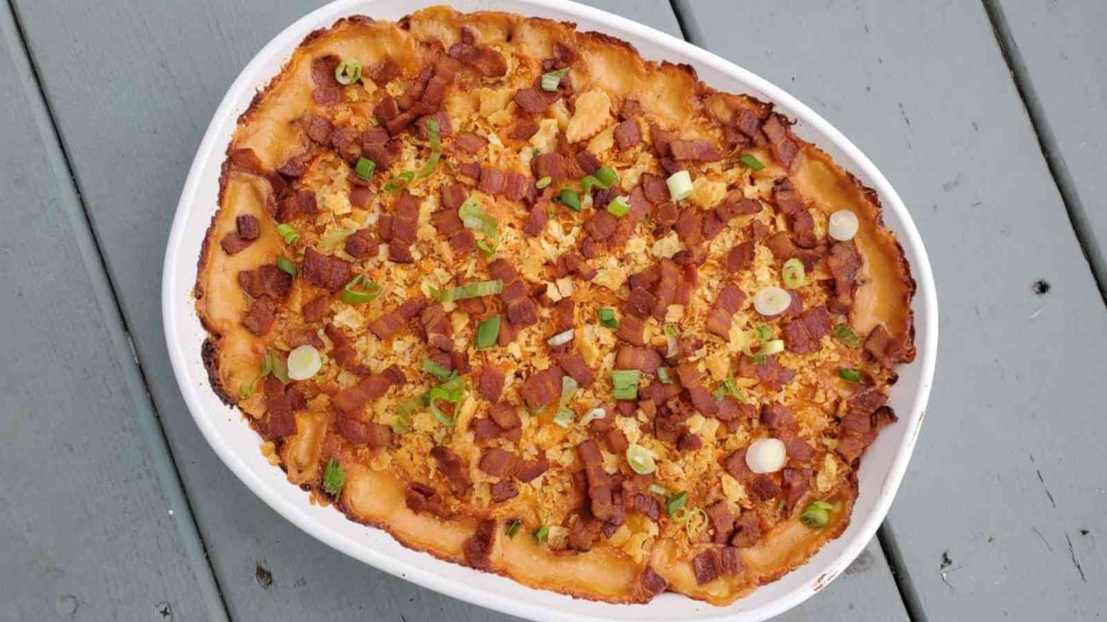 Overhead image of corn casserole in a white dish.