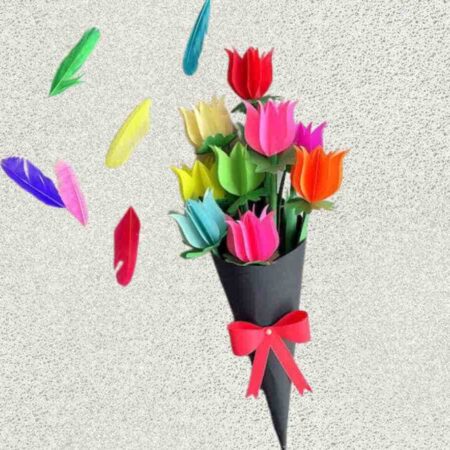 A bouquet of multicolored tulips in a black paper cone with a red bow. Colorful feathers float nearby on a textured background.