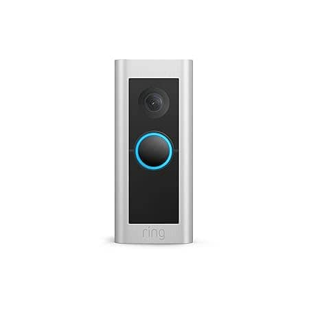 A silver and black Ring video doorbell with a circular button illuminated by a blue light, camera lens above the button, and "ring" logo below.