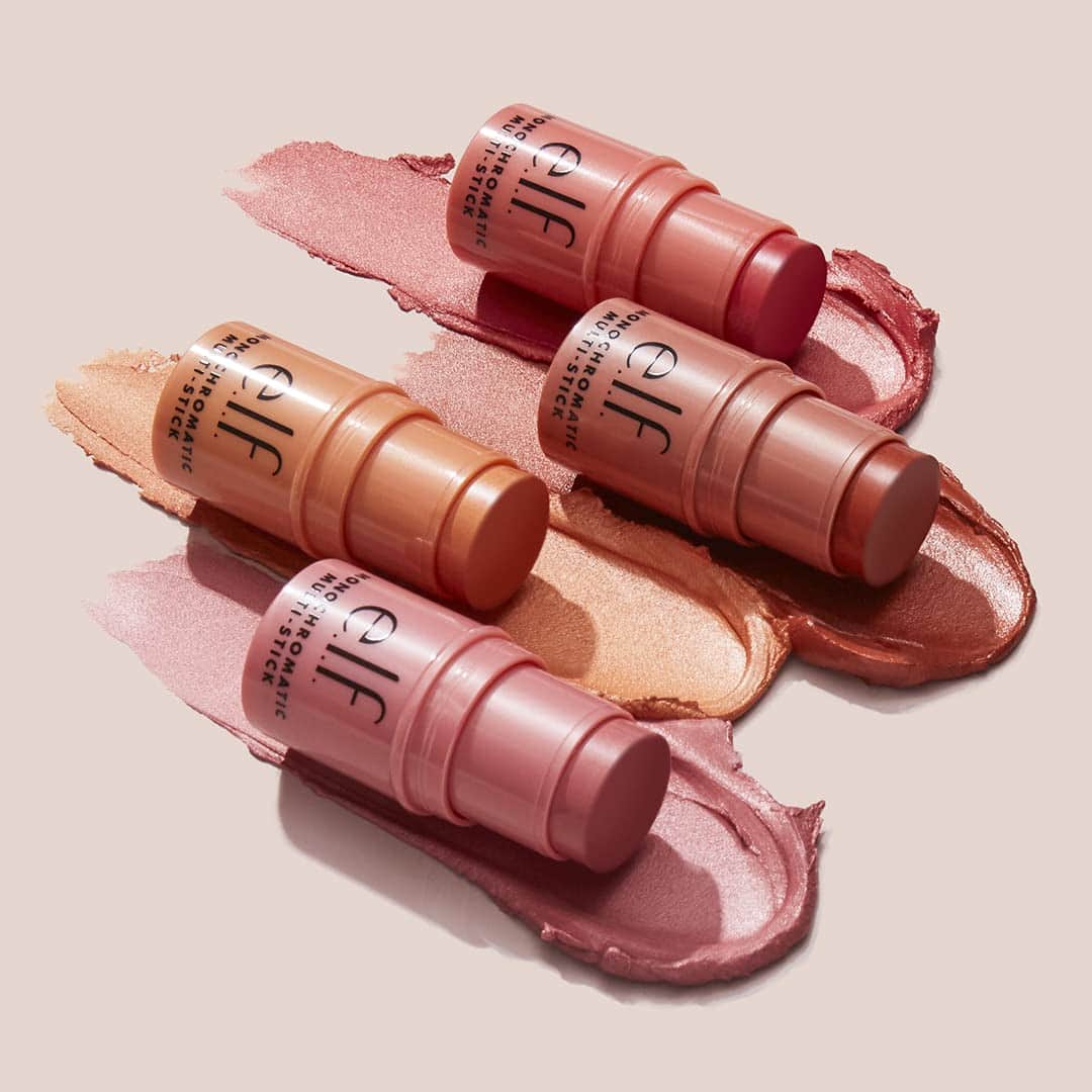 Four e.l.f. multi-use stick blushes in pink, peach, bronze, and coral shades, shown with swatches of each color on a light background.