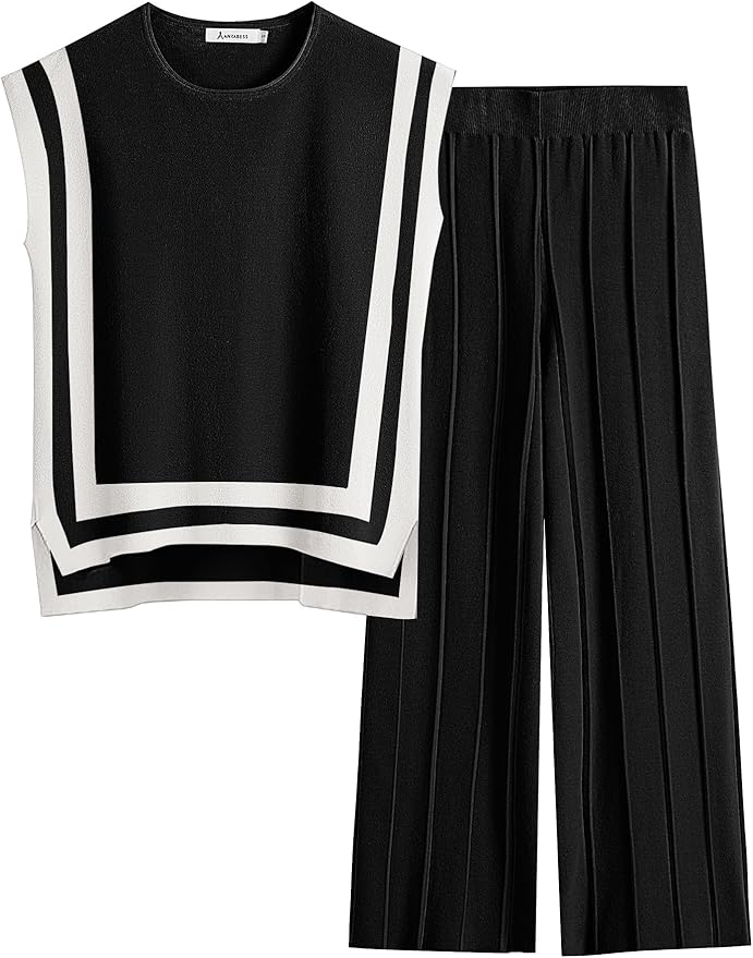 A sleeveless black top with white geometric trim paired with matching black wide-leg pants featuring vertical pleats.