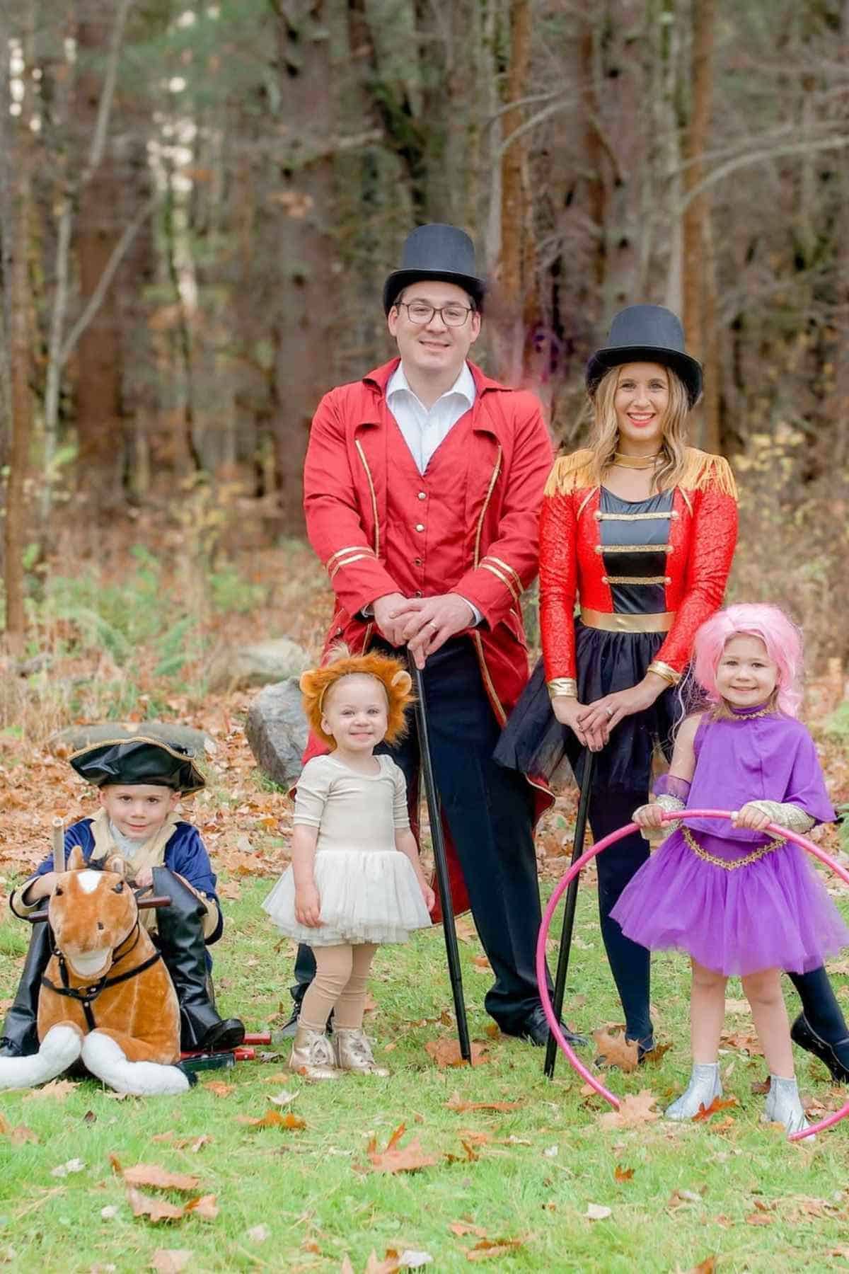 A family of five wearing "The Greatest Showman" costumes.