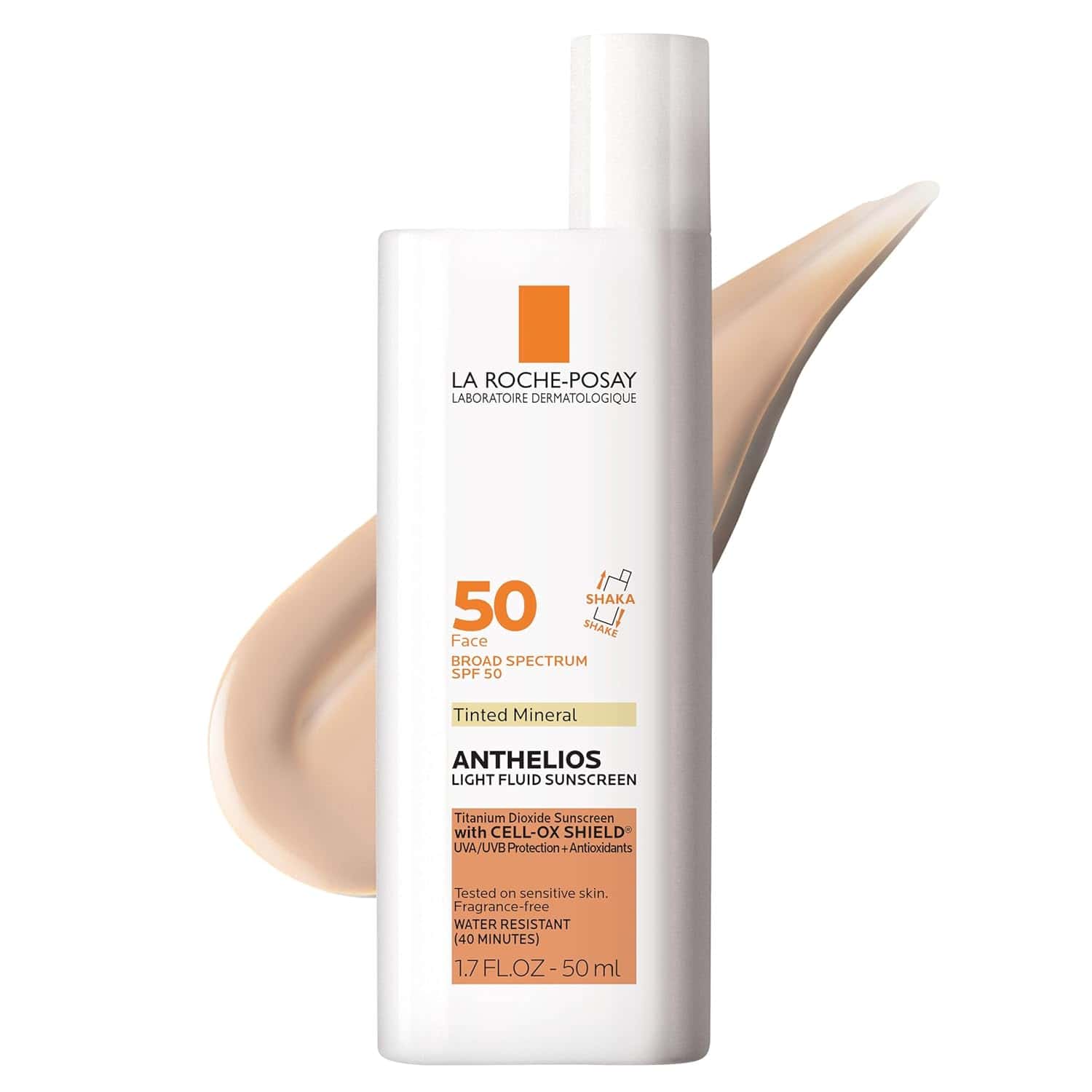 A bottle of La Roche-Posay Anthelios Tinted Mineral Light Fluid Sunscreen SPF 50 is shown against a white background with a swipe of sunscreen.