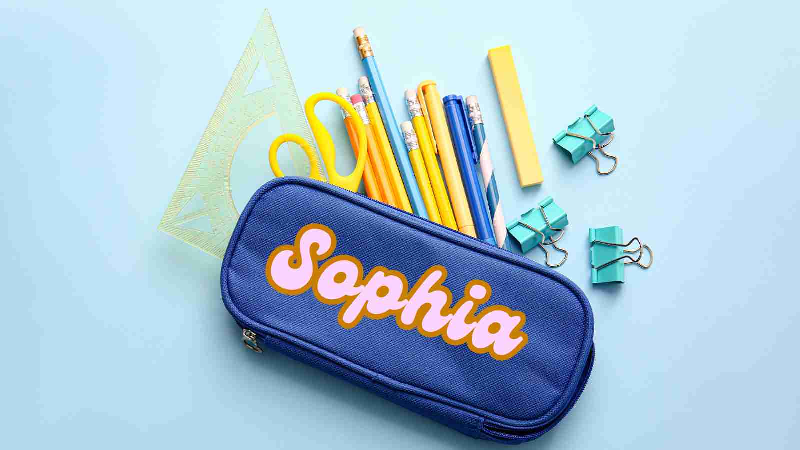 A blue pencil case with the name "Sophia" on it is surrounded by various school supplies on a light blue background.