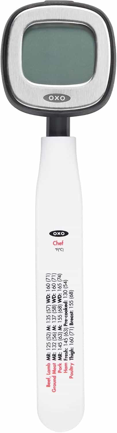 A digital food thermometer with a display screen and a white handle labeled with temperature guidelines for various meats from the brand OXO.