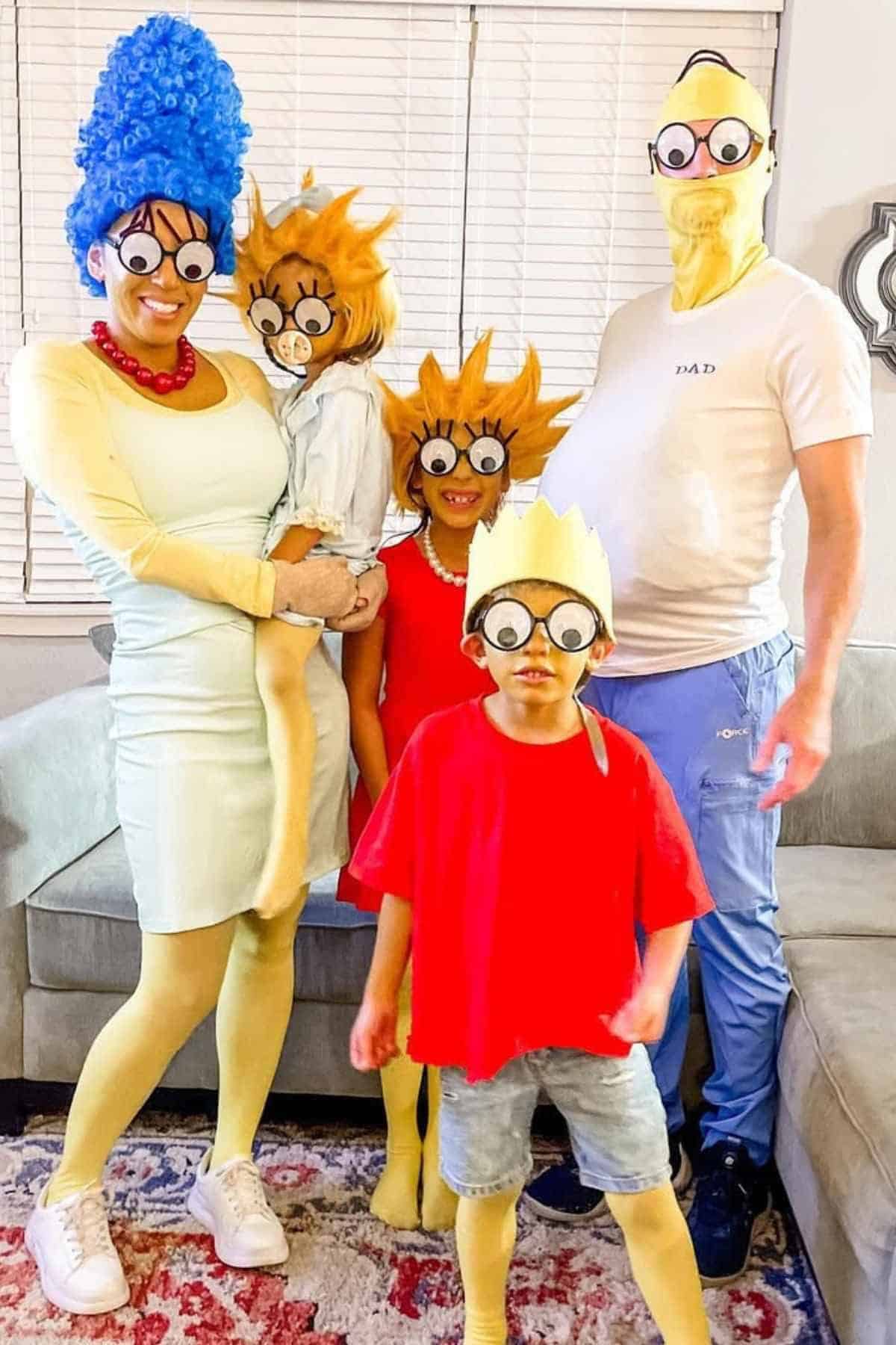 A family of five wearing costume characters inspired by The Simpsons cartoon.