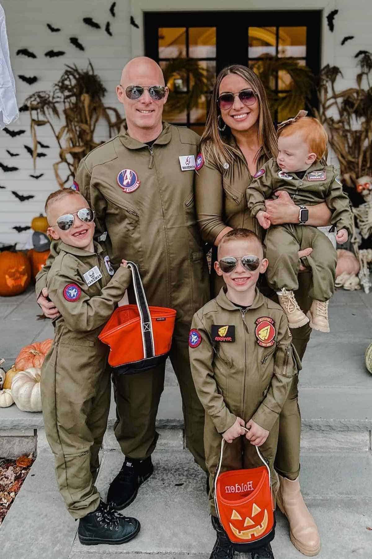 All family of five wearing "Top Gun" costumes.