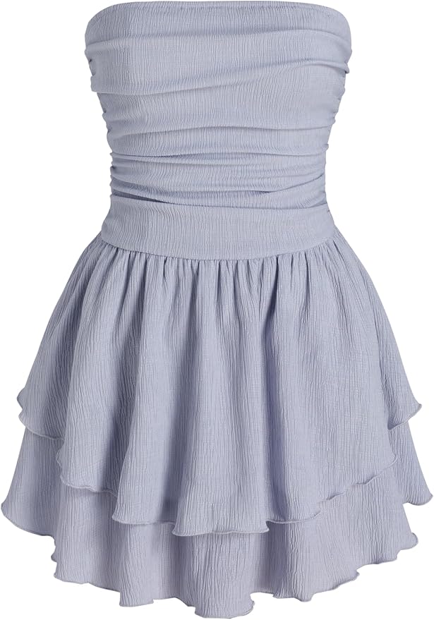 Strapless, light purple dress with a ruched, fitted bodice and a layered, ruffled skirt.