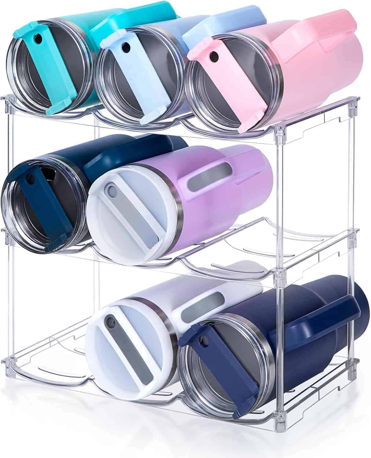 Six insulated travel mugs in various colors are stored horizontally on a three-tiered metal rack.