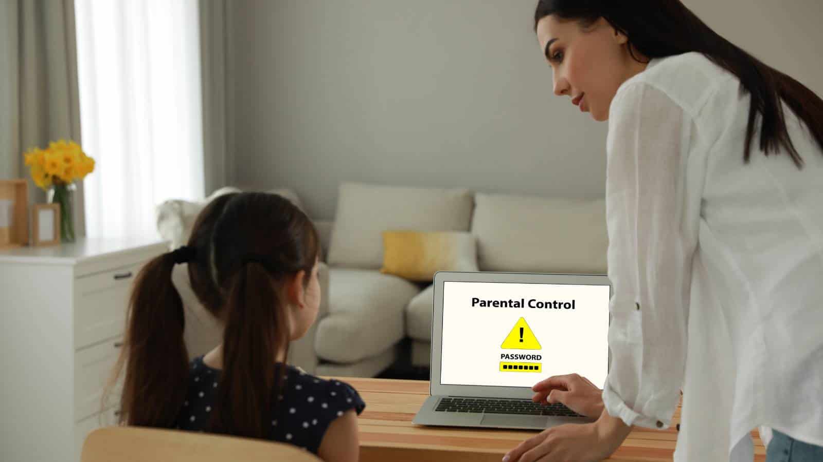 A woman shows a young girl a laptop screen displaying a warning sign and the words "Parental Control" with a password entry field.