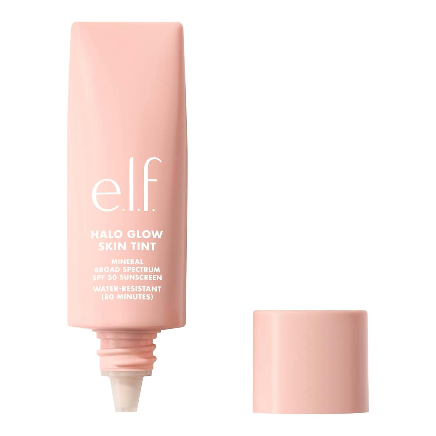A pink tube of e.l.f. Halo Glow Skin Tint with its cap removed, showing the product's nozzle. The label mentions SPF 30 sunscreen and water resistance for 80 minutes.