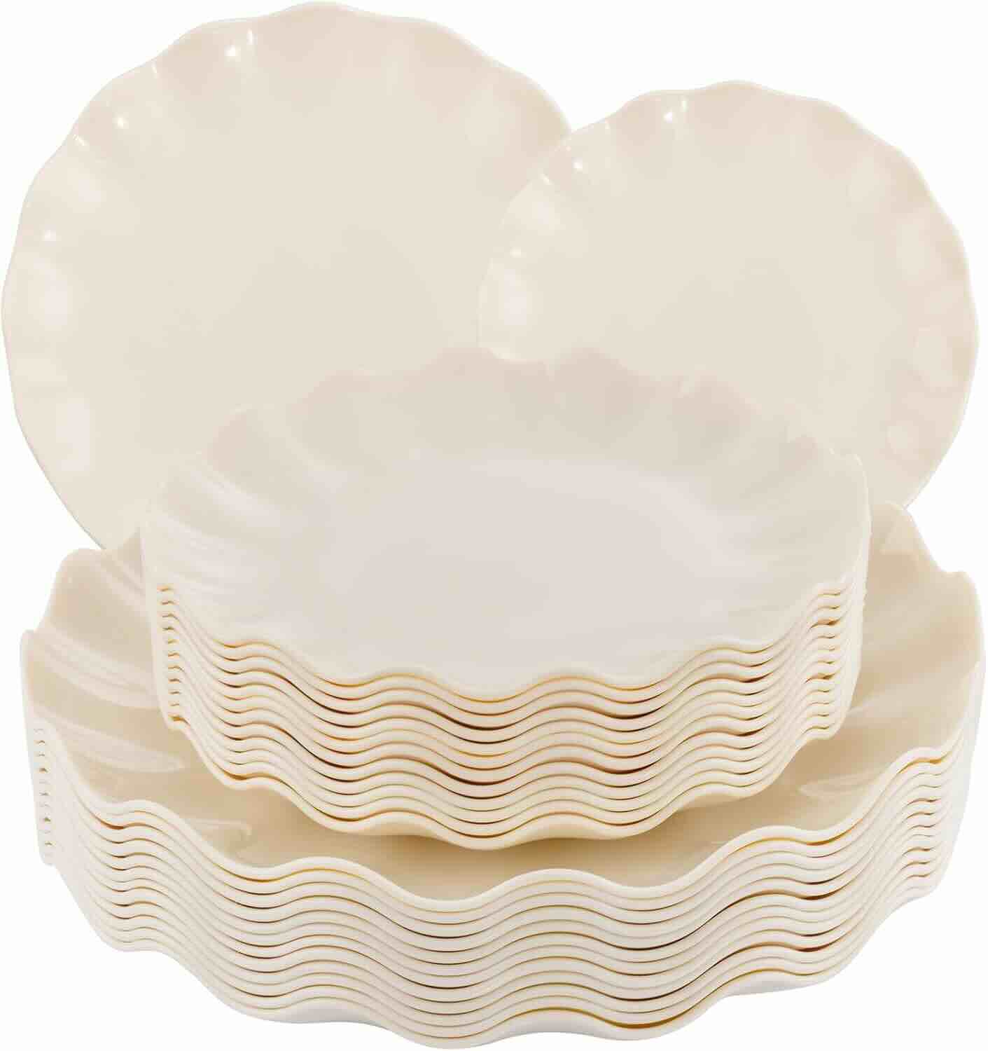 A stack of cream-colored plates with scalloped edges, arranged in multiple layers with two plates standing upright at the back.