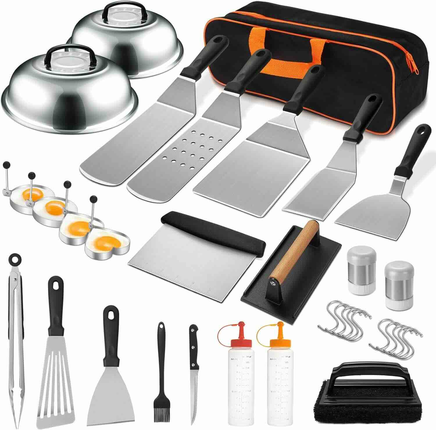 Stainless steel grill tools set with spatulas, tongs, skewers, and accessories for outdoor cooking.
