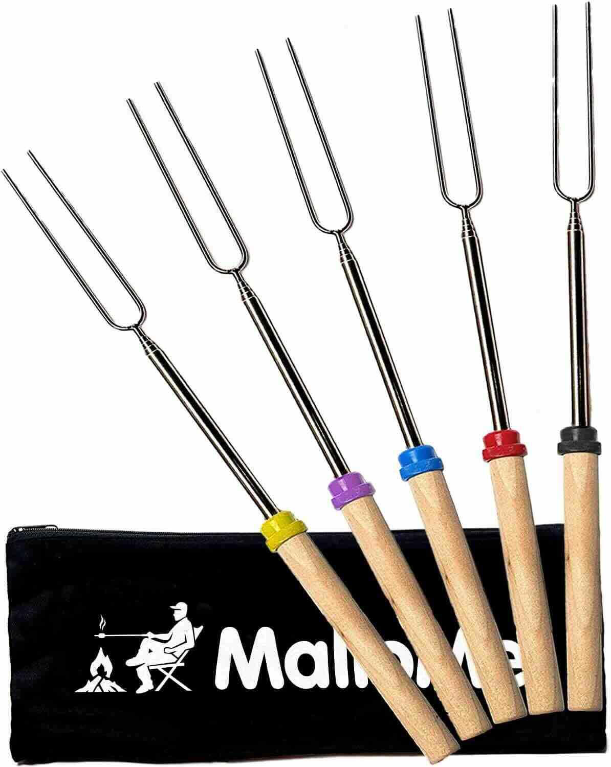 Five metal roasting forks with wooden handles and colored bands are displayed in front of a black carrying case labeled "Marshmallow.