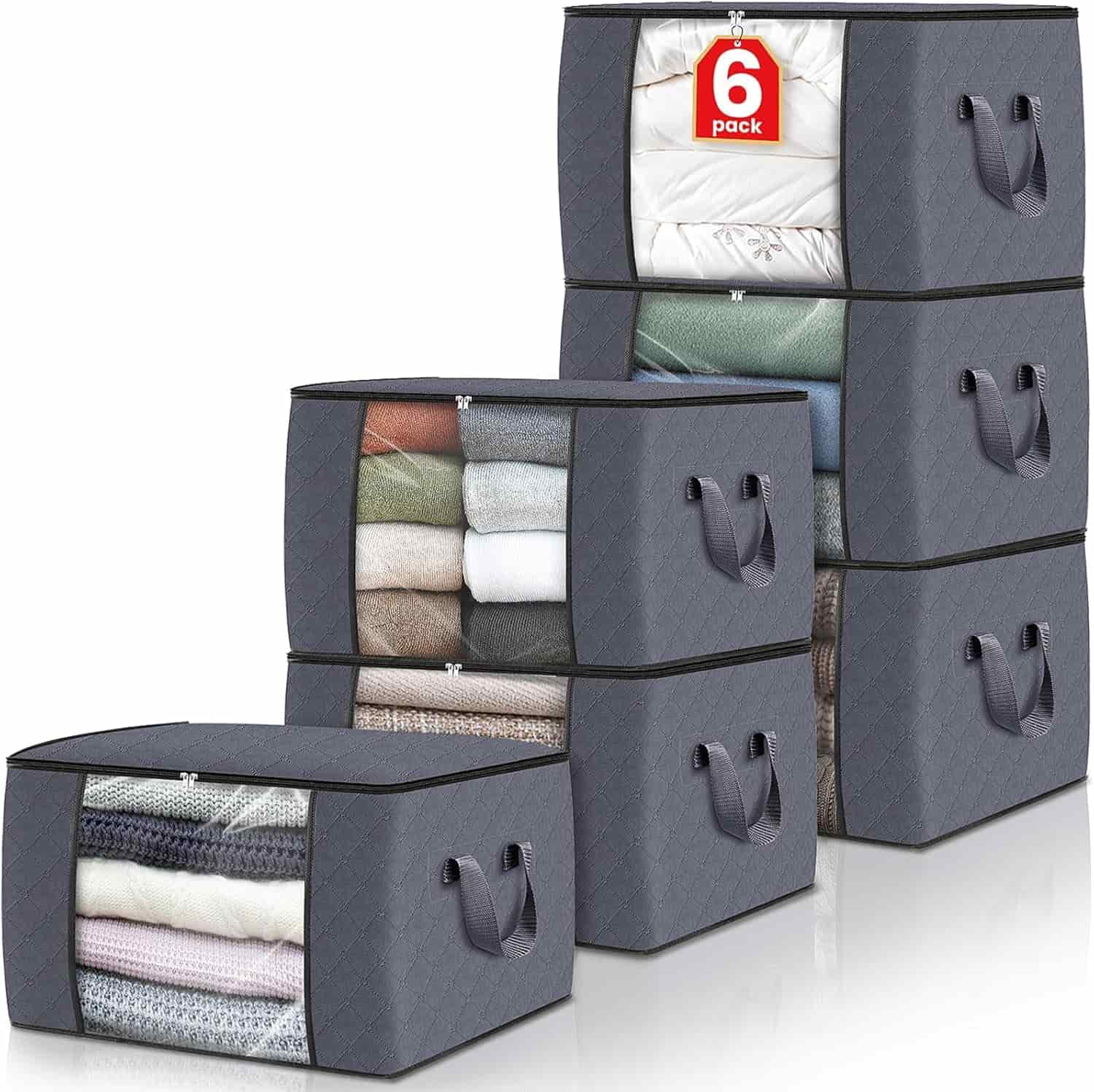 Six gray fabric storage bags with clear front panels, each filled with folded clothes or bedding, are stacked in two rows. A red tag reads "6 pack.