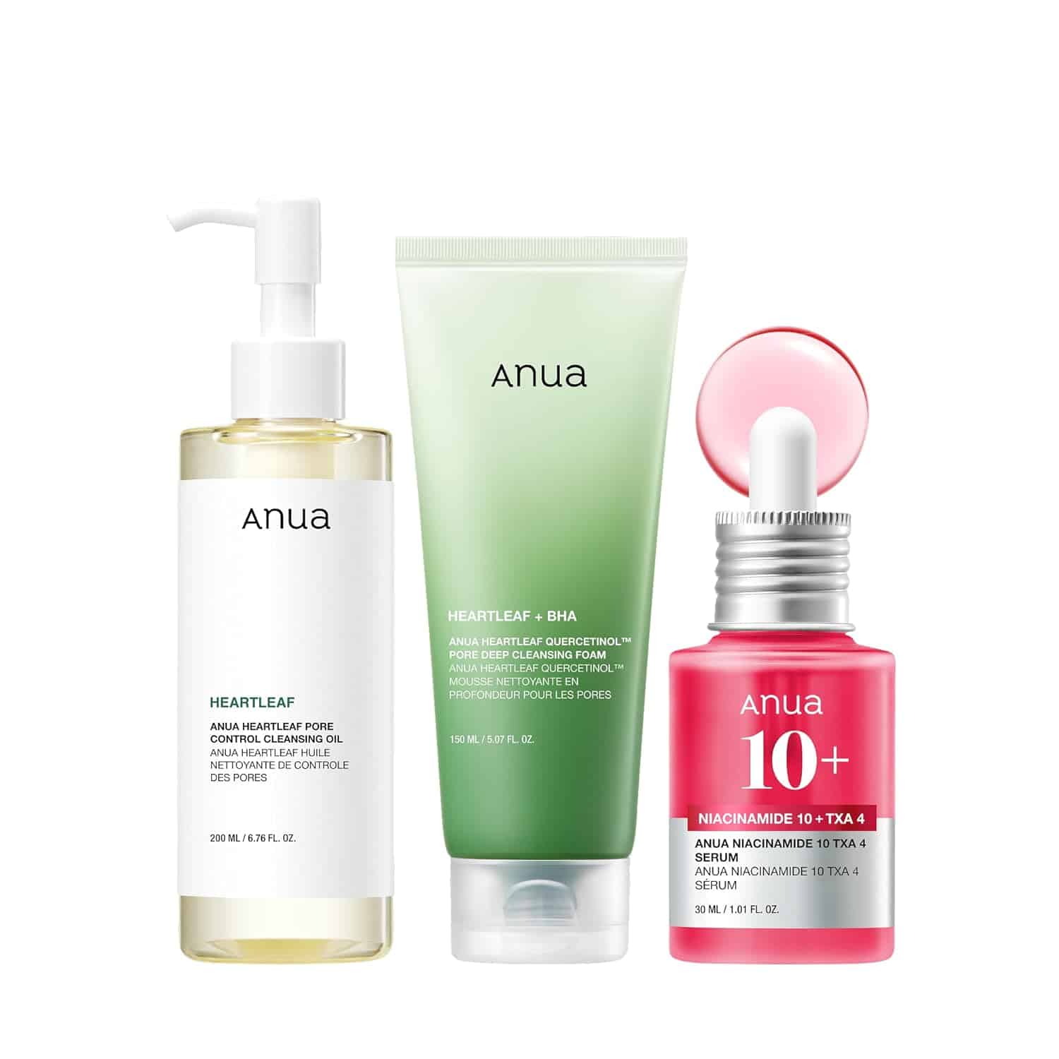 Three Anua skincare products: a Heartleaf pore control cleansing oil with pump, a BHA foam cleanser in a green tube, and a Niacinamide 10+ serum in a pink bottle with dropper.