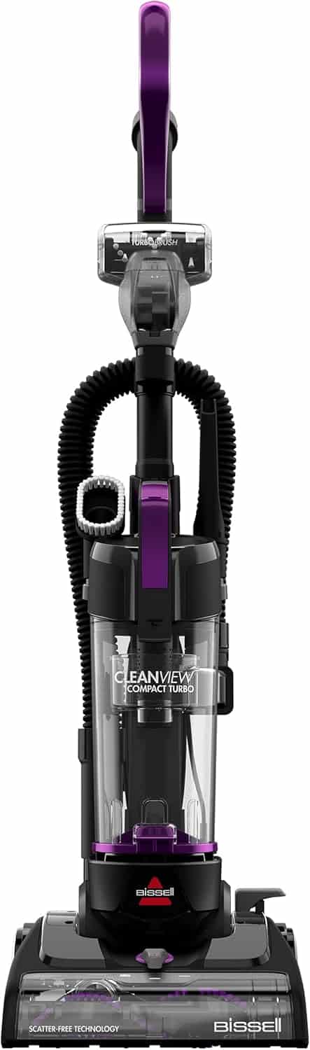 Front view of a Bissell CleanView Compact Turbo upright vacuum cleaner with a transparent dust bin and purple accents.