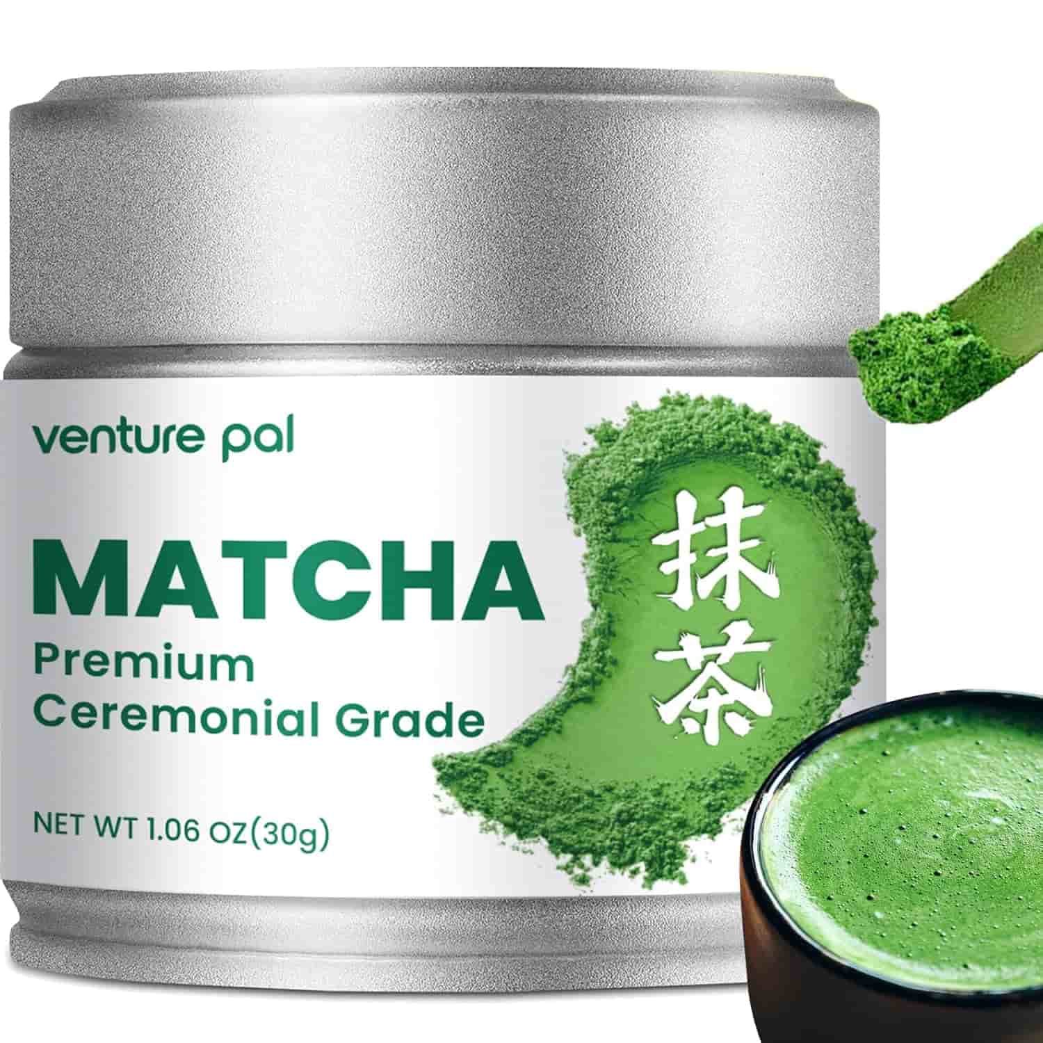 A silver tin labeled "Venture Pal Matcha Premium Ceremonial Grade" with matcha powder and a bowl of prepared matcha tea beside it.