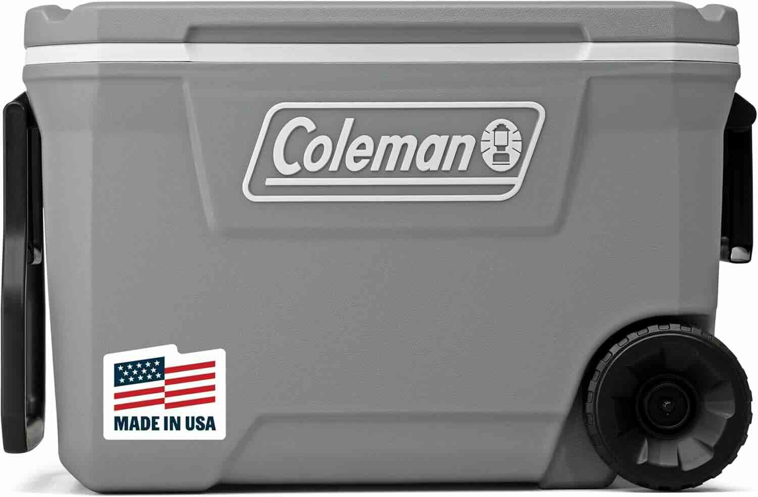 A gray Coleman wheeled cooler with a side handle and a "Made in USA" label featuring an American flag.