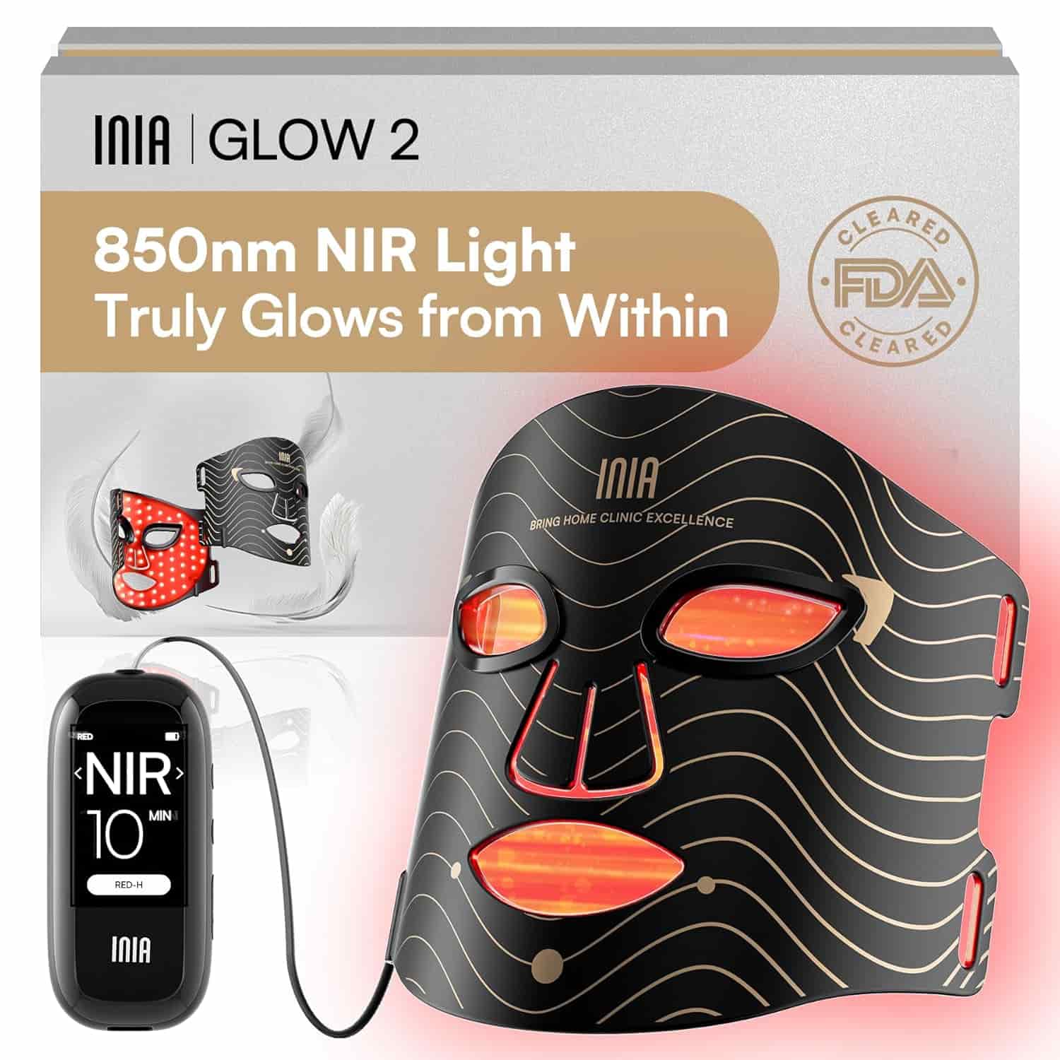 Black and gold LED face mask with red lights, attached to a device labeled "NIR 10 MIN," in front of product packaging that highlights "850nm NIR Light" and FDA clearance.