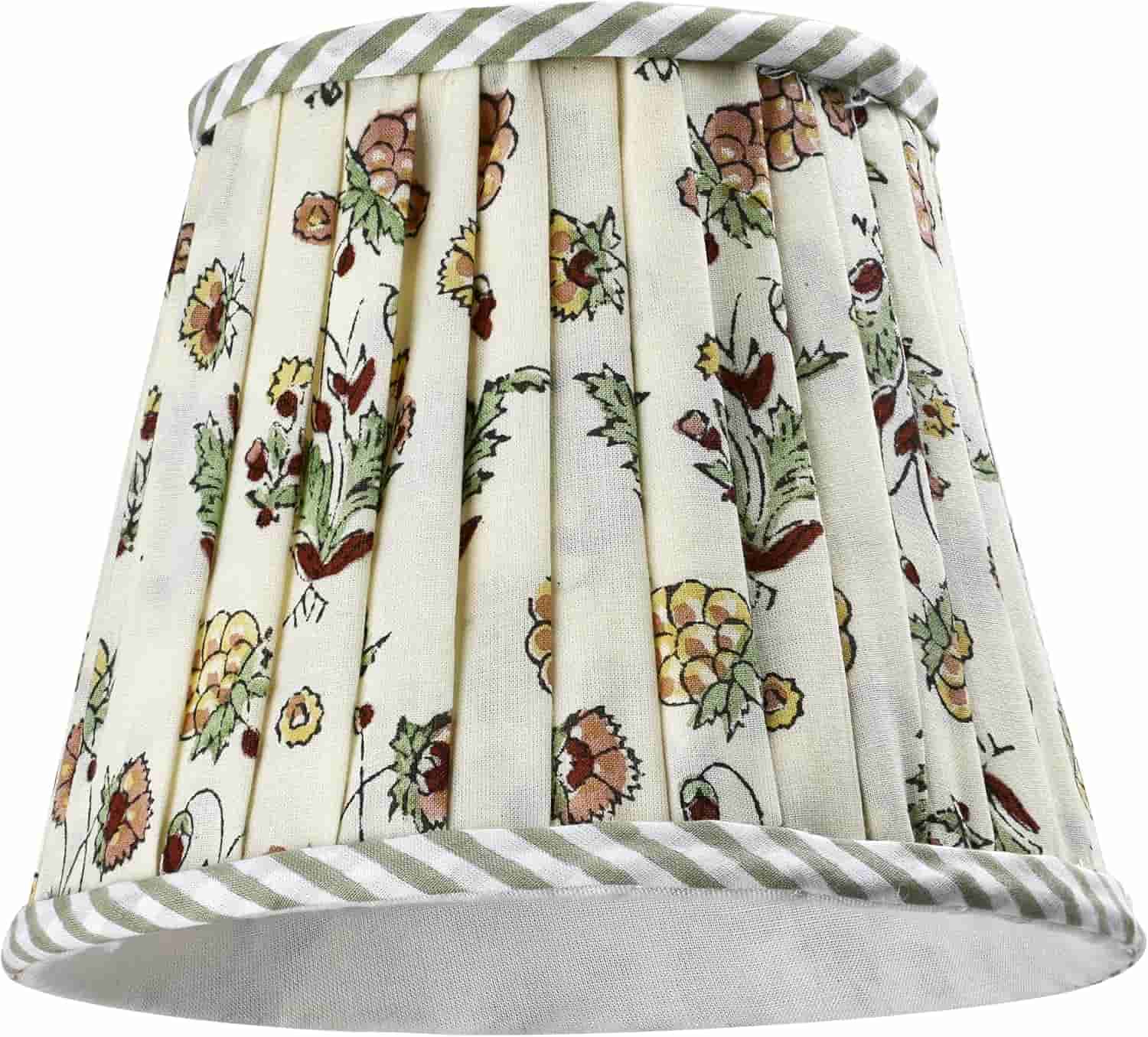 A pleated lampshade with a striped trim and a floral pattern on cream-colored fabric.