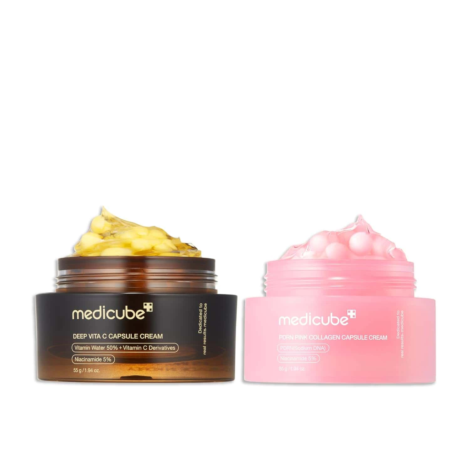 Two jars of Medicube creams: one brown jar labeled "Deep Vita C Capsule Cream" with yellow capsules, and one pink jar labeled "Forn Pink Collagen Capsule Cream" with pink capsules.
