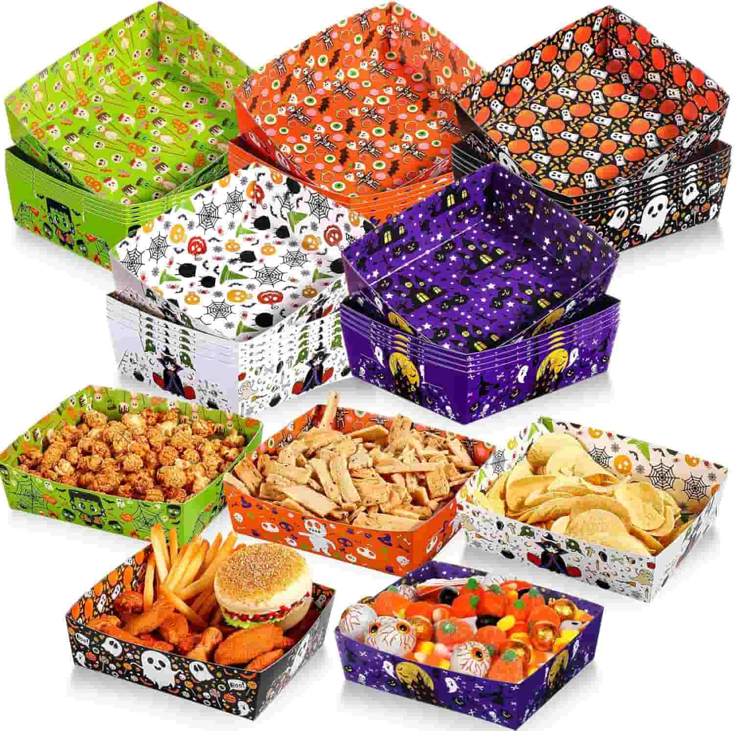 Assorted Halloween-themed food trays filled with various snacks, including popcorn, fries, chips, burger, candy, and dried meat.