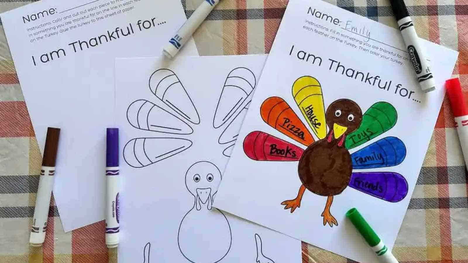 Three Thanksgiving turkey coloring worksheets are on a plaid tablecloth; one is blank, one is partially colored, and one is fully colored with things to be thankful for written on the feathers.