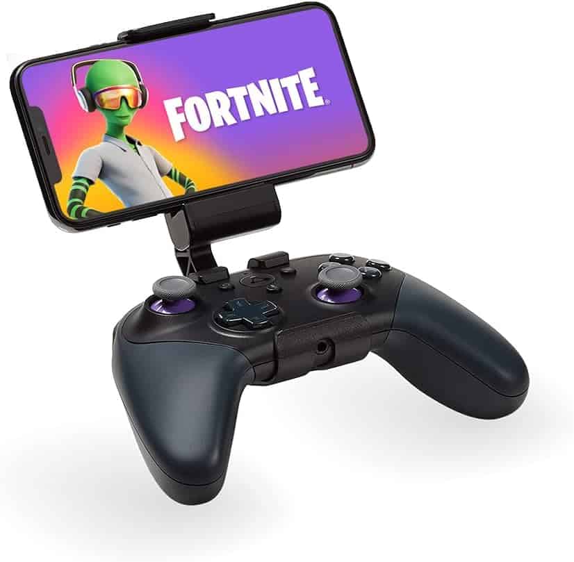 A smartphone displaying Fortnite is mounted on a black gaming controller with purple accents.