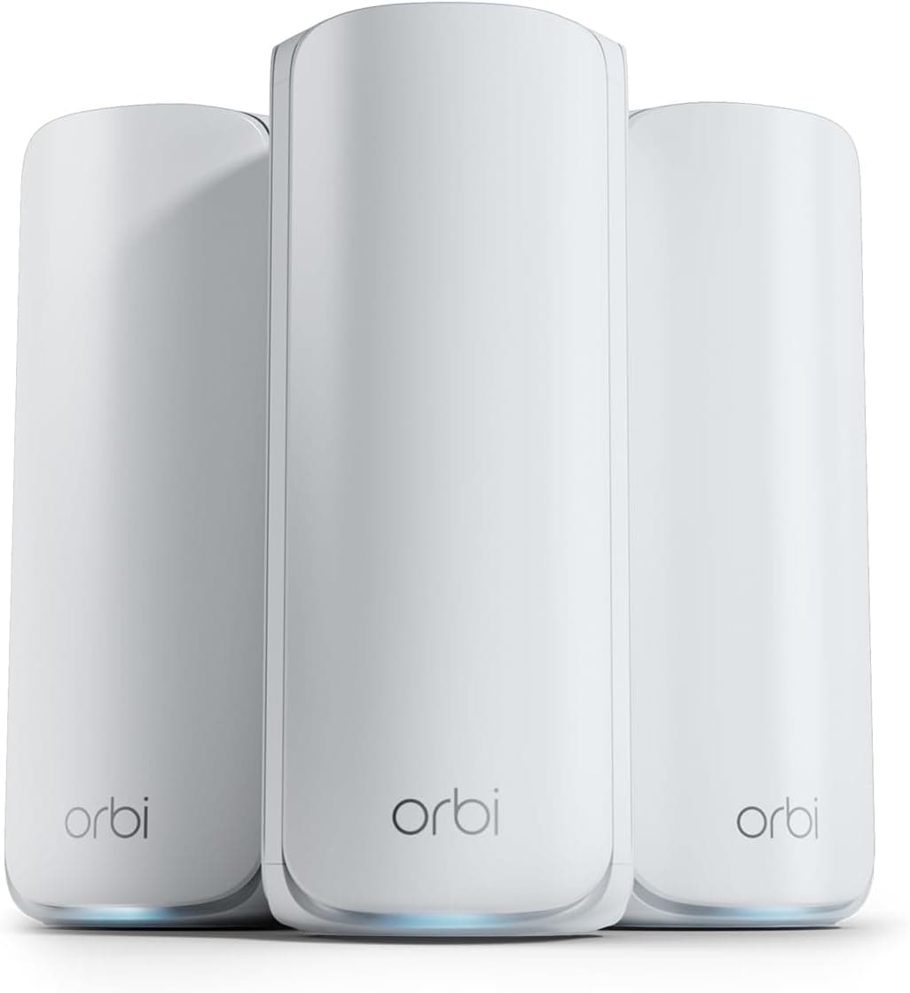 Three white Orbi WiFi mesh network devices with a sleek, modern design, standing upright side by side.