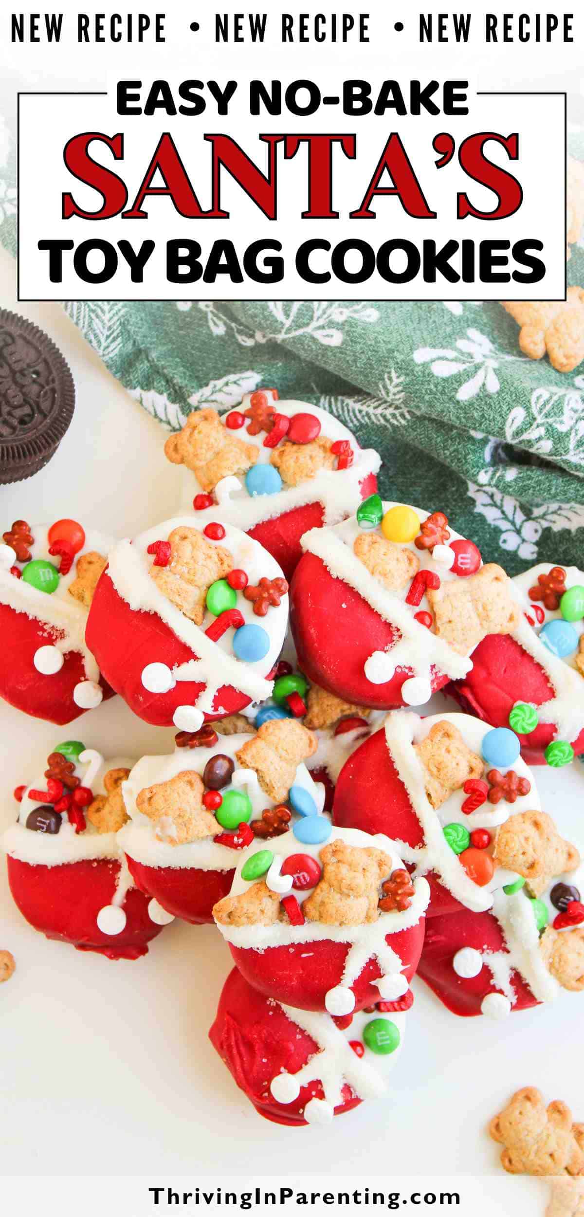 A platter of Christmas themed Oreos and no-bake cookies decorated as red Santa bags, filled with small bear-shaped cookies, red and green candies, and white icing.
