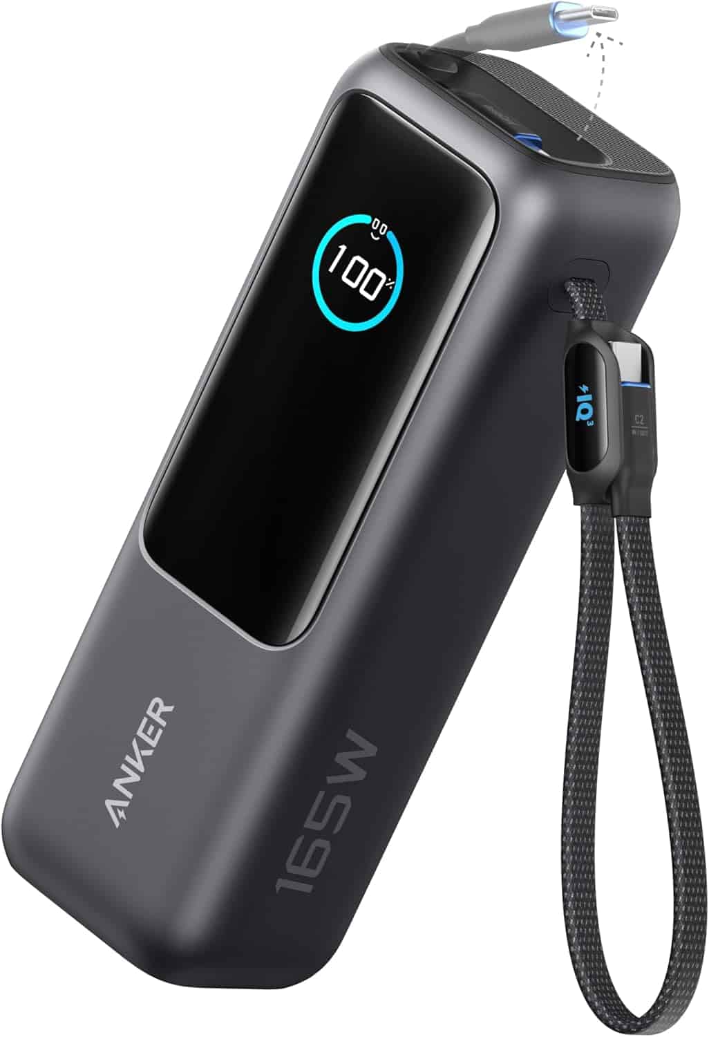 A black Anker 165W portable power bank with a digital display showing 100% charge, a braided carrying strap, and a charging cable connected.