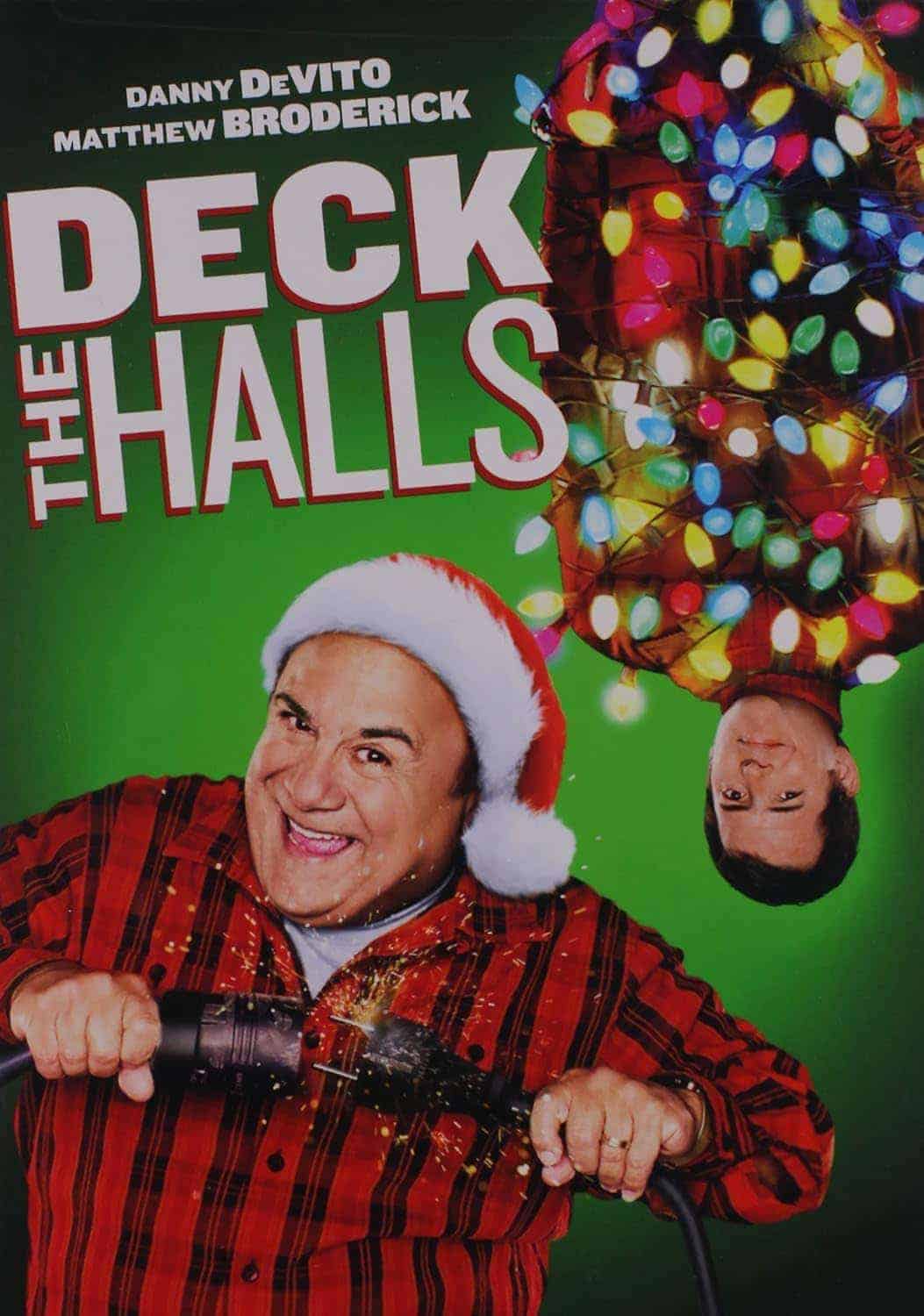 Movie poster for "Deck the Halls" showing a man in a Santa hat holding power tools and another man hanging upside down wrapped in Christmas lights.