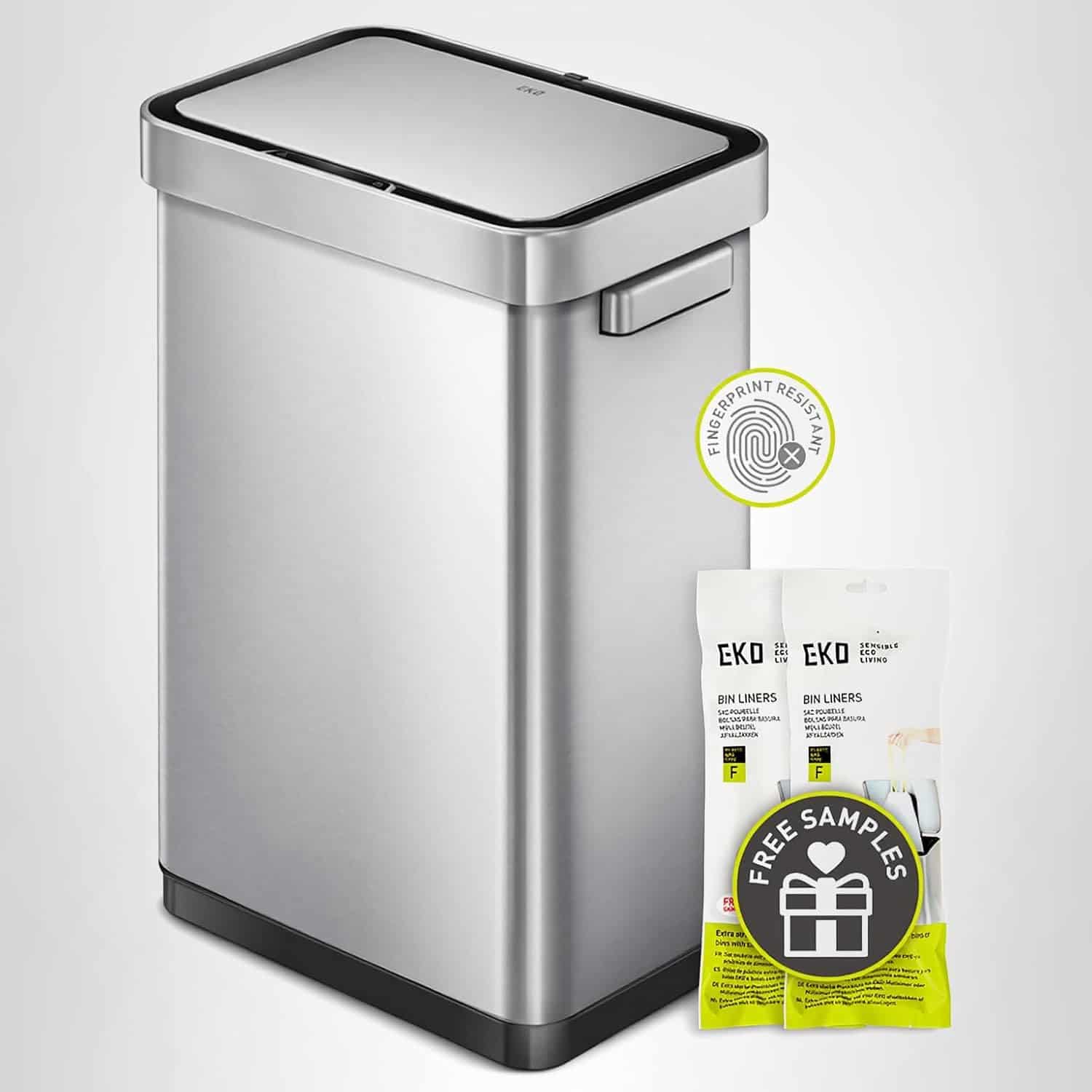 A stainless steel rectangular trash can with a closed lid, fingerprint-resistant label, and two packs of EKO bin liners labeled "Free Samples" in front.