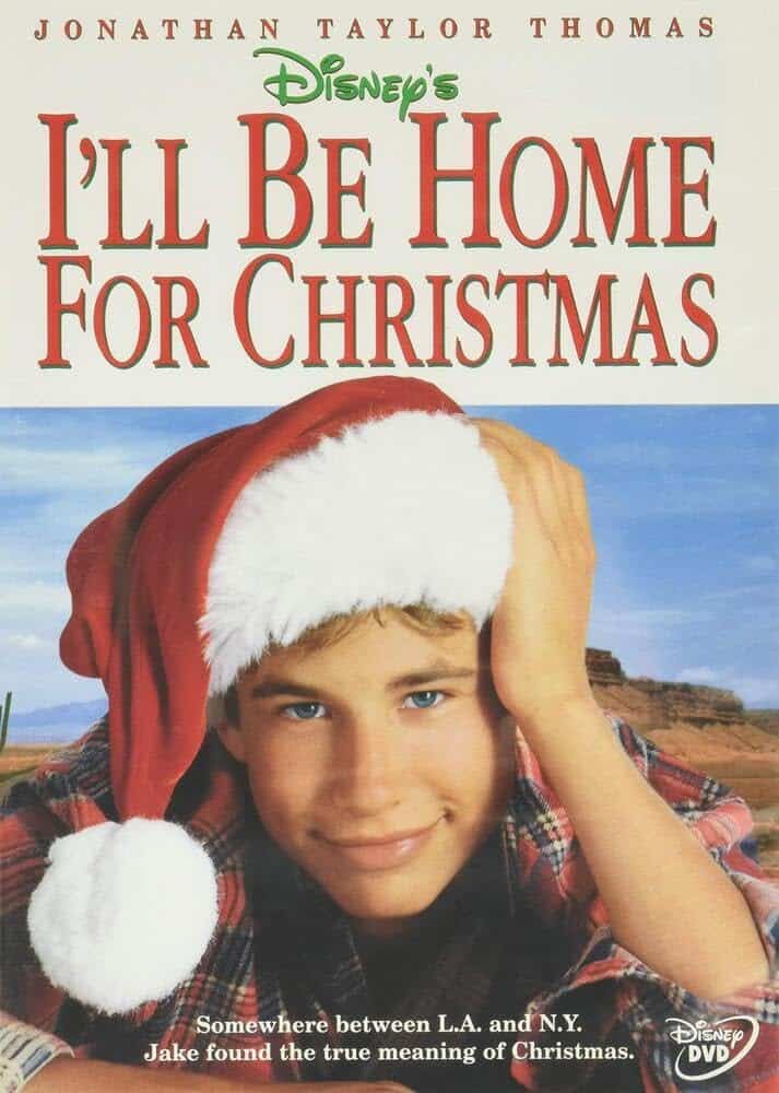 DVD cover for "I'll Be Home For Christmas" showing a boy in a Santa hat, with title and actor's name at the top and a tagline at the bottom.