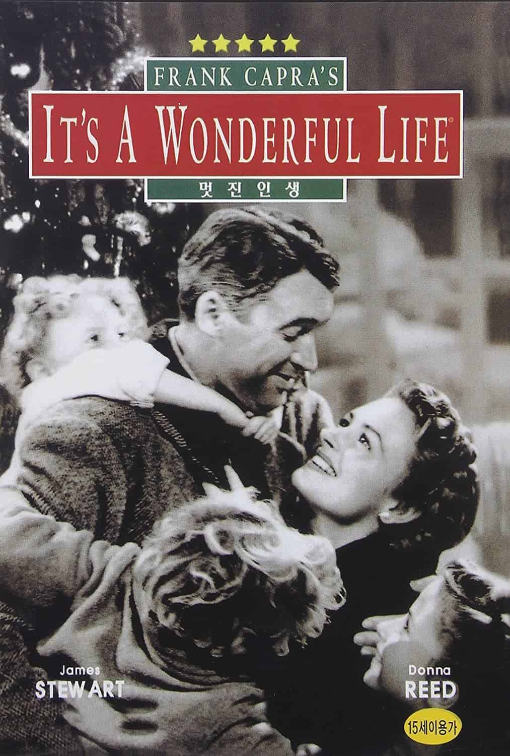 Black-and-white movie poster for "It's a Wonderful Life" showing a joyful family embracing, with the title and cast names James Stewart and Donna Reed displayed.