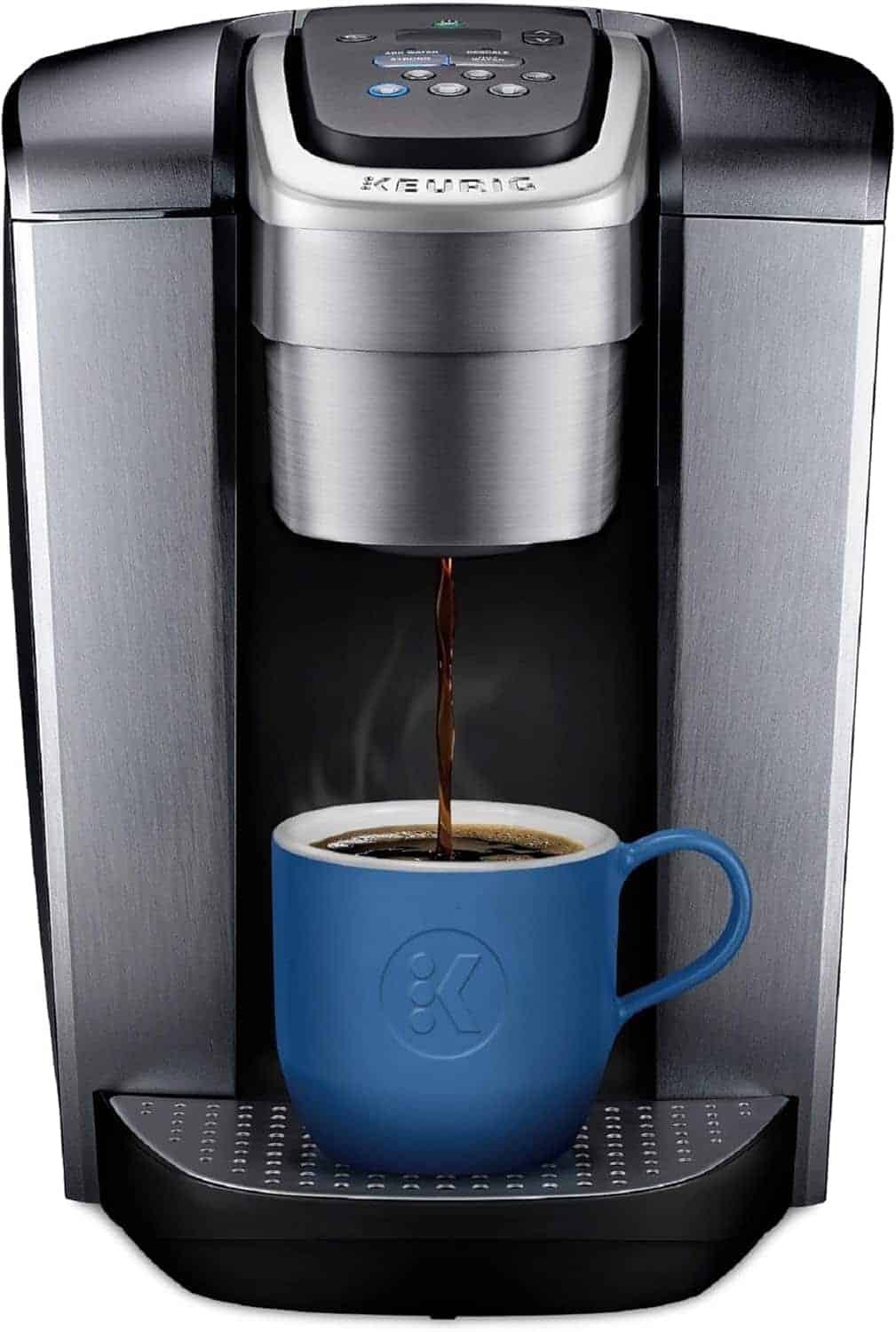 A Keurig coffee maker dispensing coffee into a blue mug placed on the drip tray.