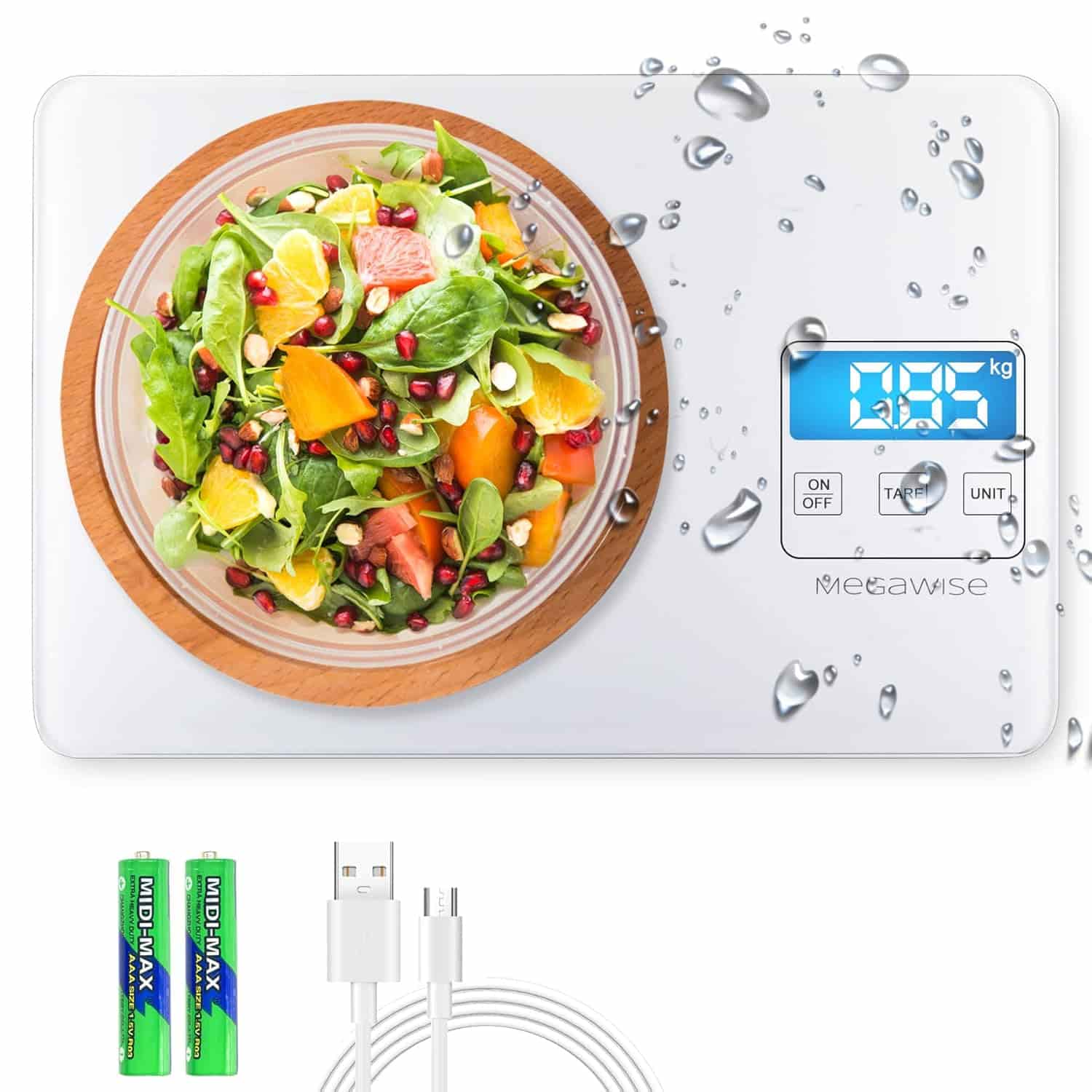 Digital kitchen scale with a bowl of salad on top, water splashes on the surface, LCD screen displaying weight, and accessories including batteries and a USB charging cable.