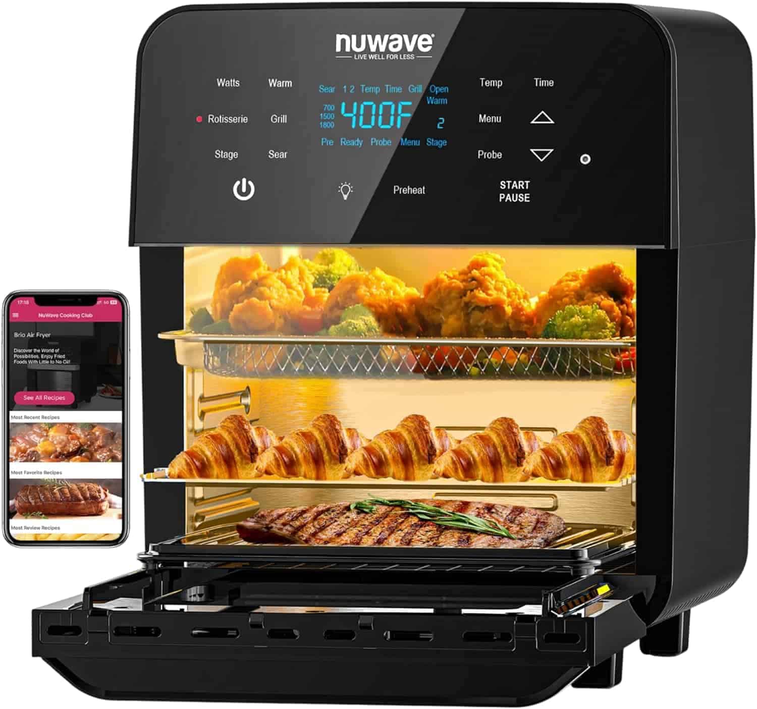 A digital air fryer oven with food inside, including steak, croissants, and chicken wings, is shown next to a smartphone displaying a cooking app.